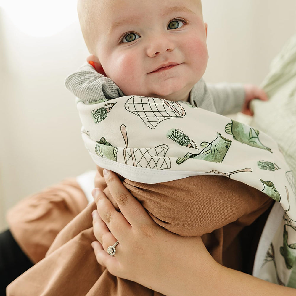 Pobibaby Gone Fishing jersey-knit texture detail.