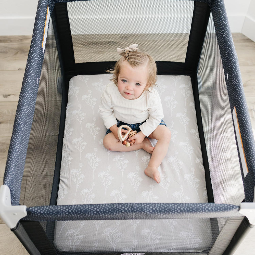 Pobibaby sheets coordinate with other woodland nursery pieces.