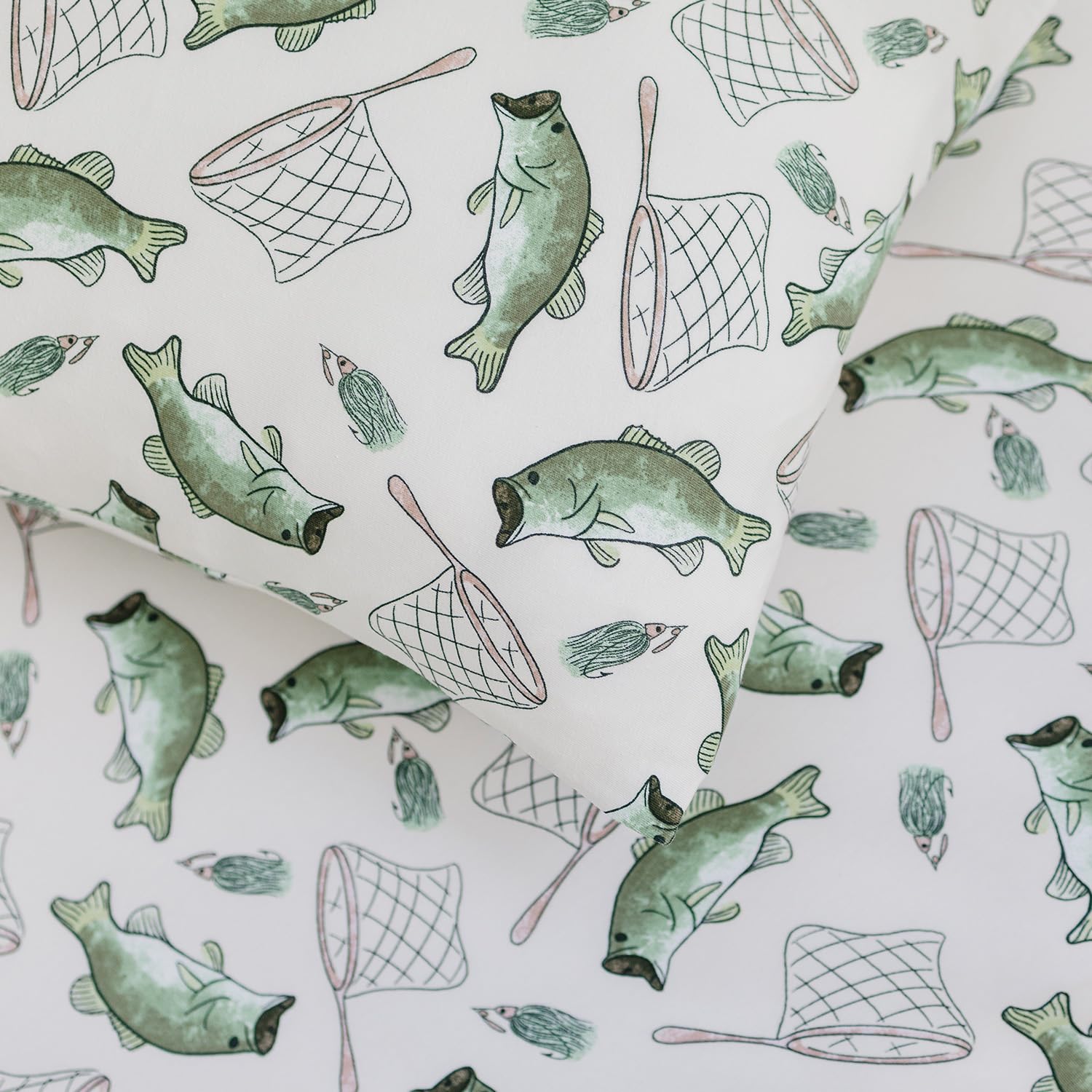 Pobibaby pillowcase coordinates with crib sheets and blankets for cohesive nursery styling.