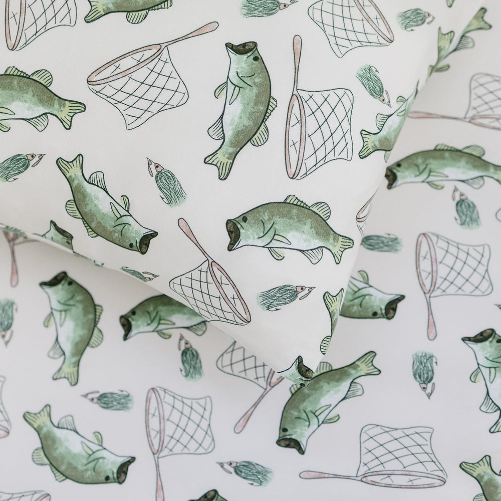 Pobibaby pillowcase coordinates with crib sheets and blankets for cohesive nursery styling.