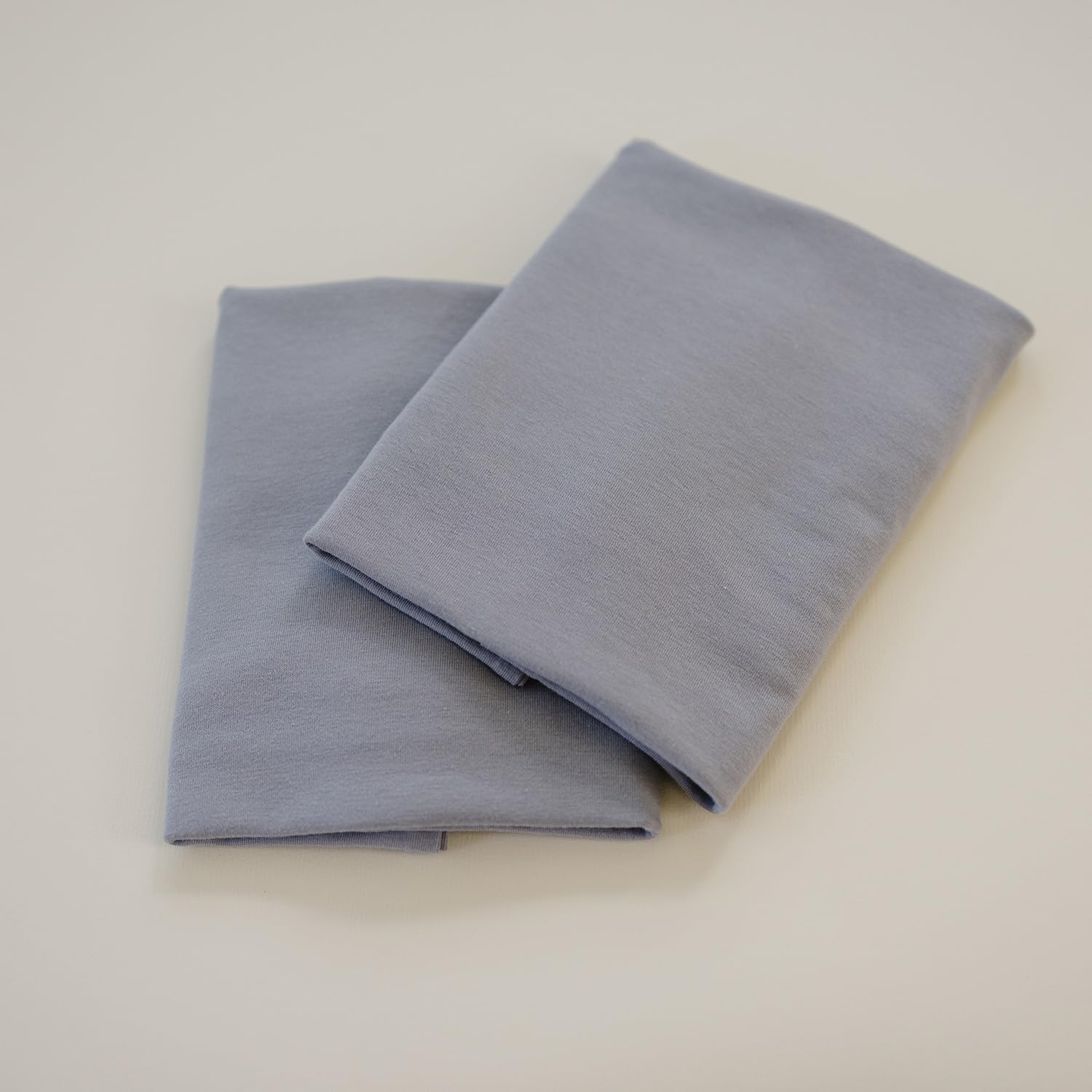 Coordinating Pobibaby nursery essentials help create a cohesive sleep space.