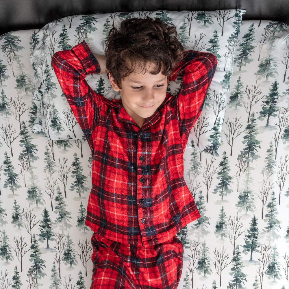 Pobibaby woodland pattern detail adds whimsy to a cozy bedtime setup.