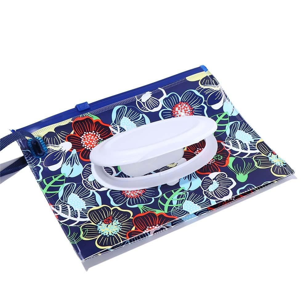Pokinge wipe holder attached to stroller for convenient access.