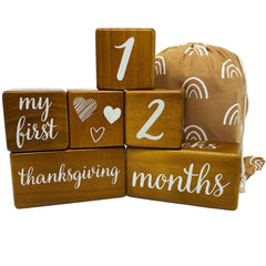 Pondering Pine milestone blocks in natural brown wood, ideal for timeless baby photos.