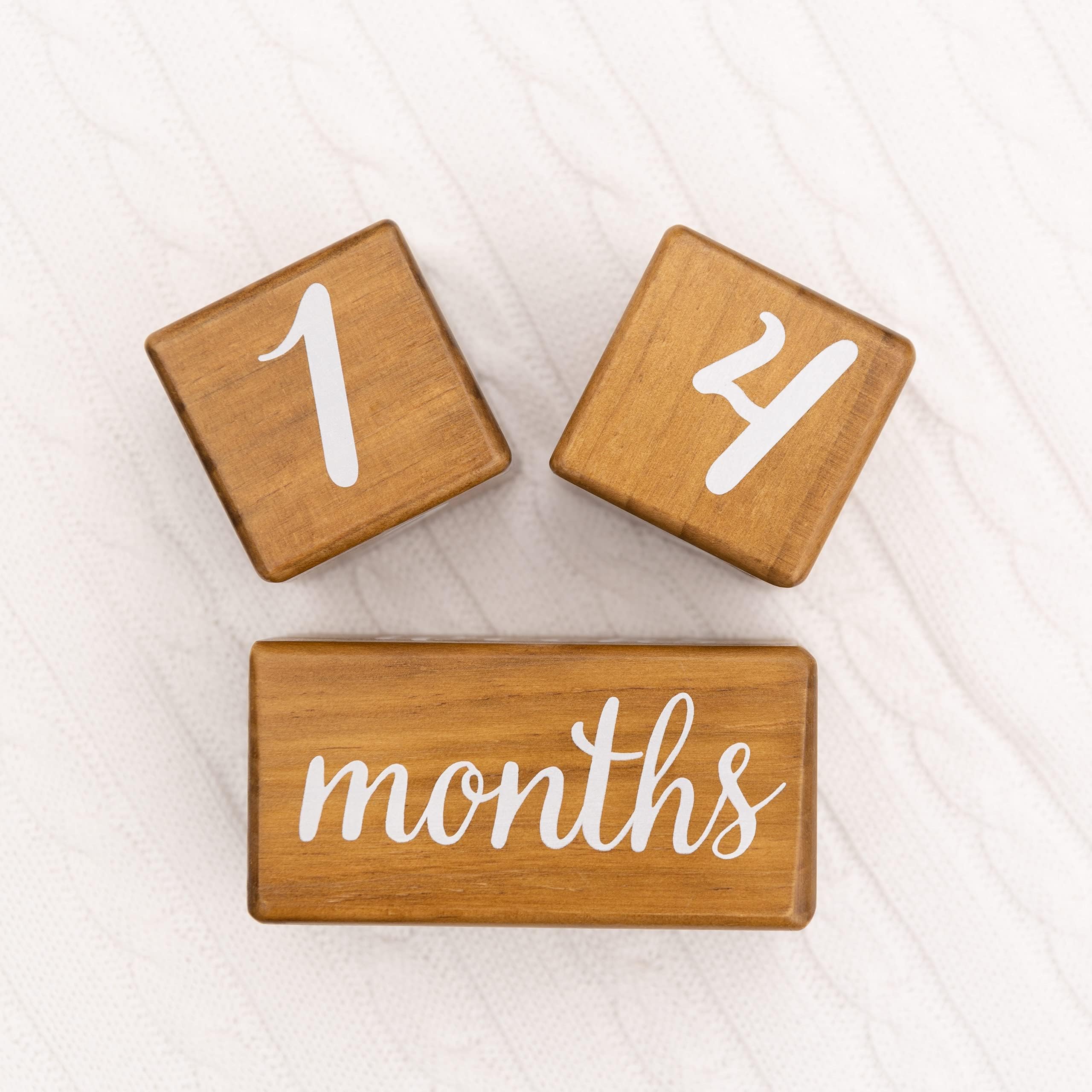 Pondering Pine weekly, monthly, and yearly milestone blocks for growing baby.