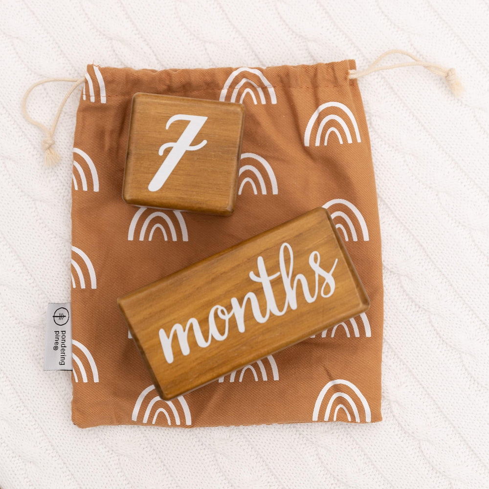 Pondering Pine milestone blocks with rounded corners, designed for baby safety.