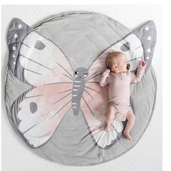 Poowe Butterfly Round Play Pad top view with soft cotton surface for tummy time.