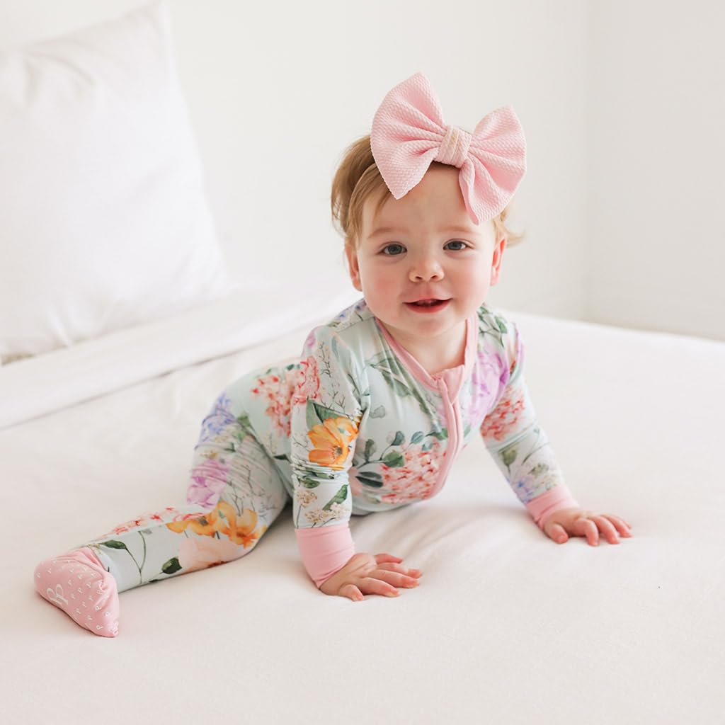 Posh Peanut Erin premie sleepers, footies with designer grips for secure movement.