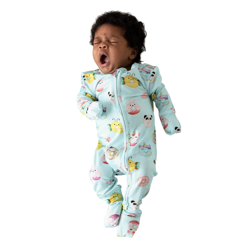 Posh Peanut convertible sleepers in pink prints offering breathable comfort for naps.