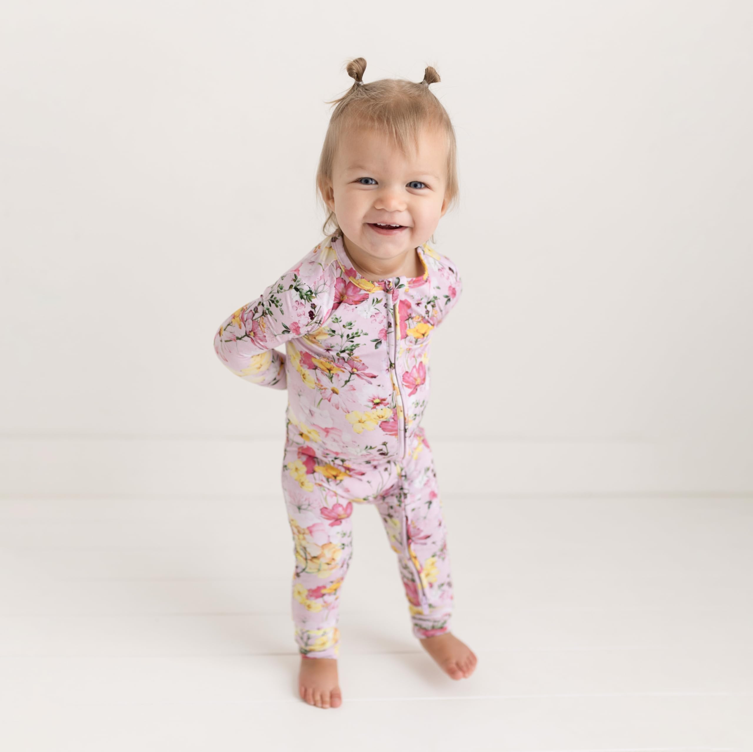 Posh Peanut Sleepers showcase a 2-way zipper for easy diaper access.