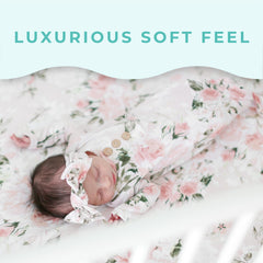 Posh Peanut crib sheet with vintage pink rose print on a standard mattress.
