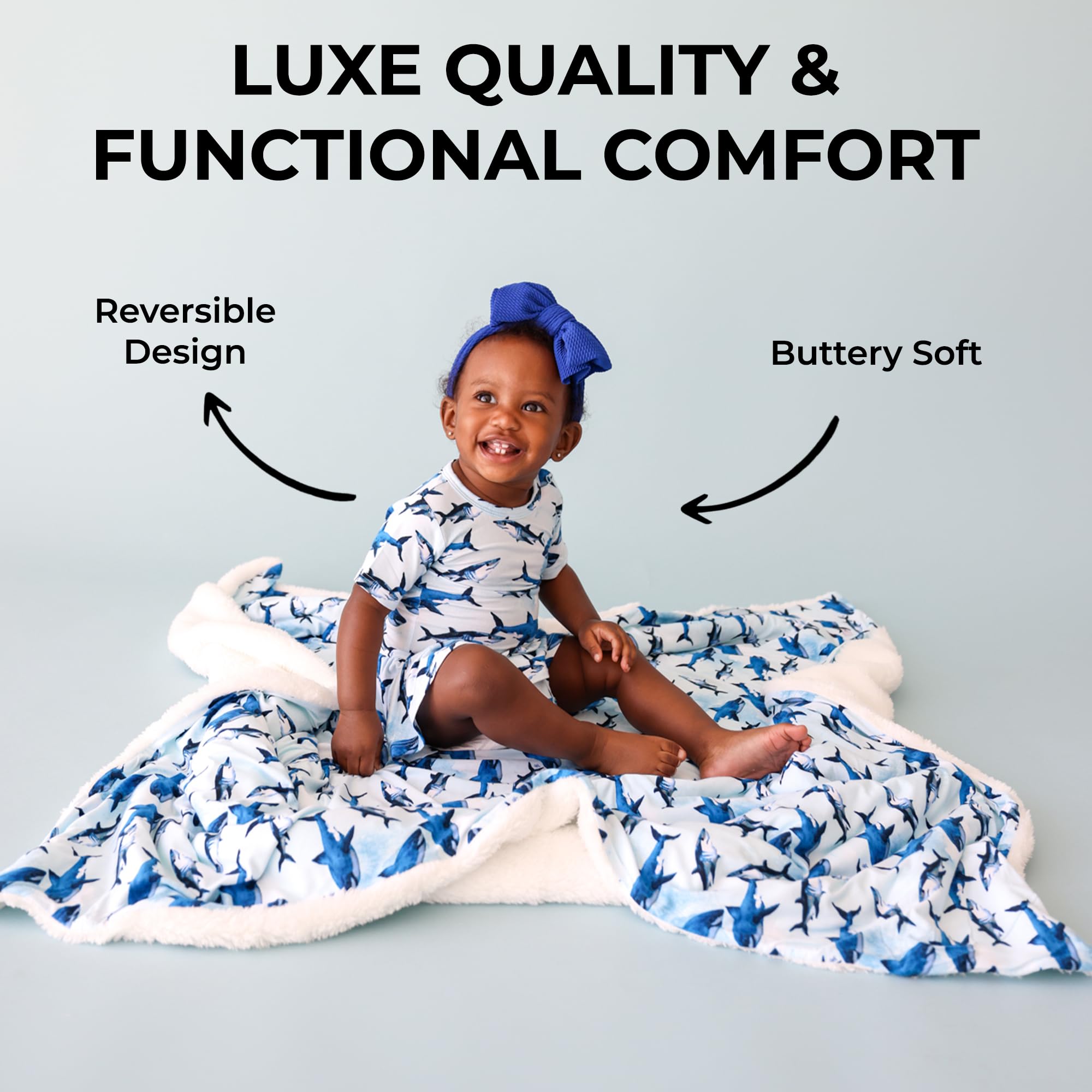 Posh Peanut Plush Patoo Sharks blanket folded for cozy portable warmth