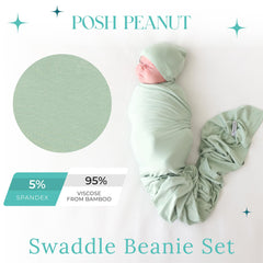 Posh Peanut Sage swaddle blanket wrapped around baby showing snug, secure wrap.