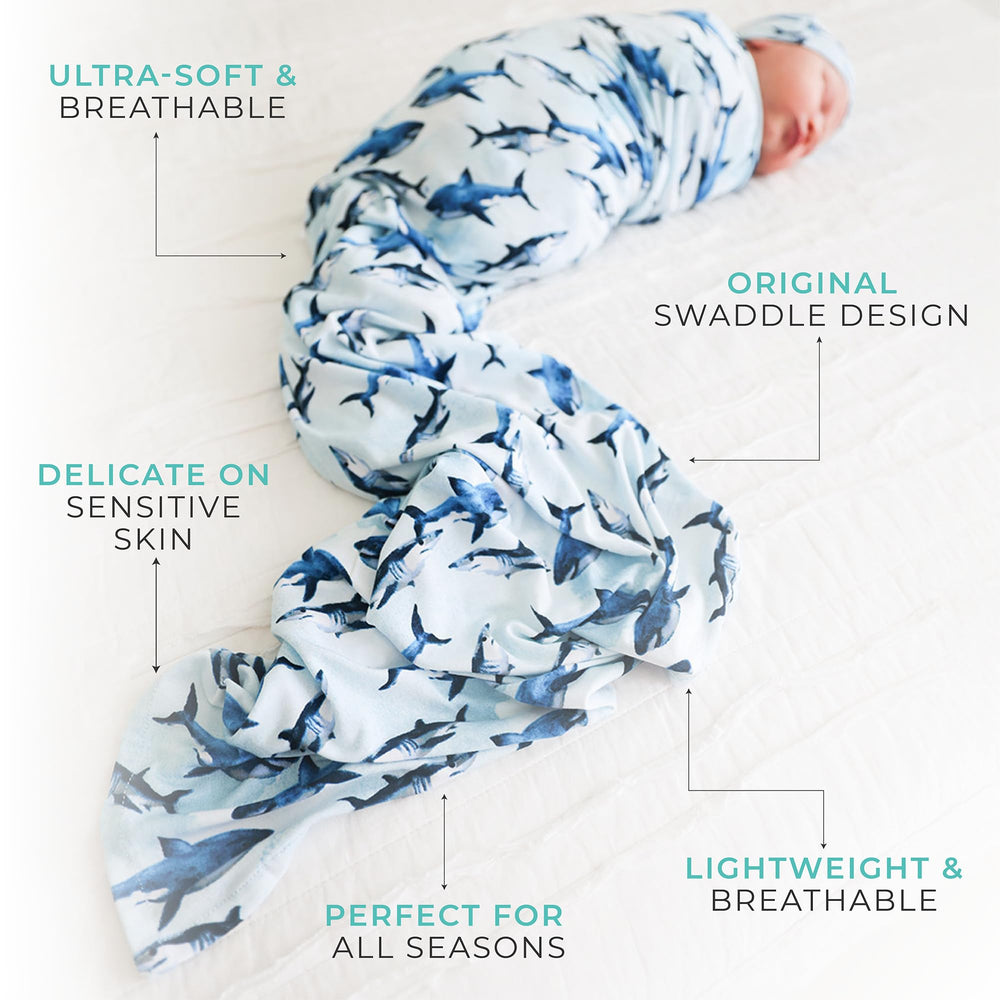 Sharks snug-fit swaddle ensures secure wrapping for peaceful sleep