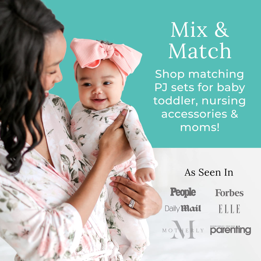Posh Peanut swaddle wrapped around baby illustrating secure, snug comfort