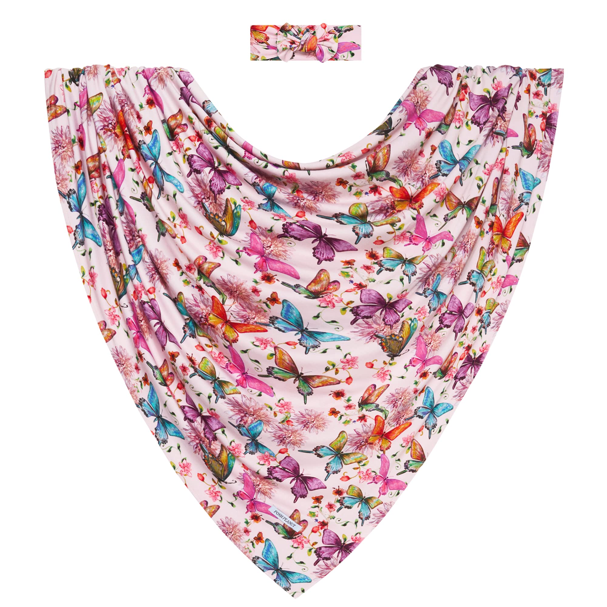 Posh Peanut watercolor butterfly nursery scene featuring the swaddle as decor and comfort.