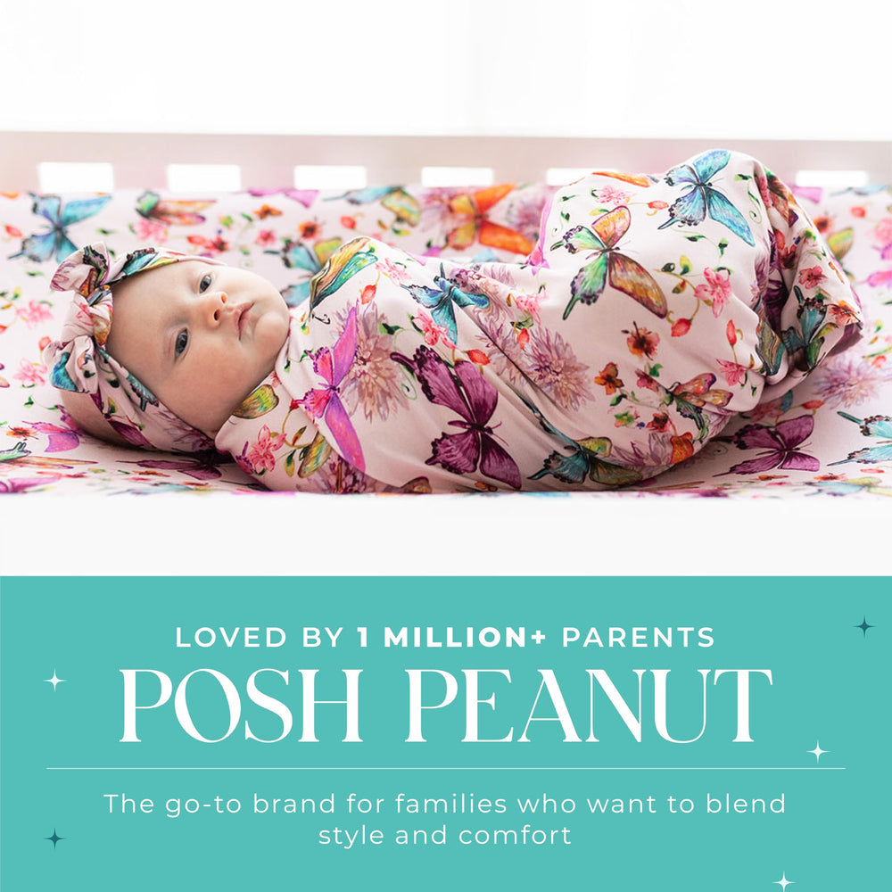 Posh Peanut stroller setup with butterfly swaddle for on-the-go comfort.
