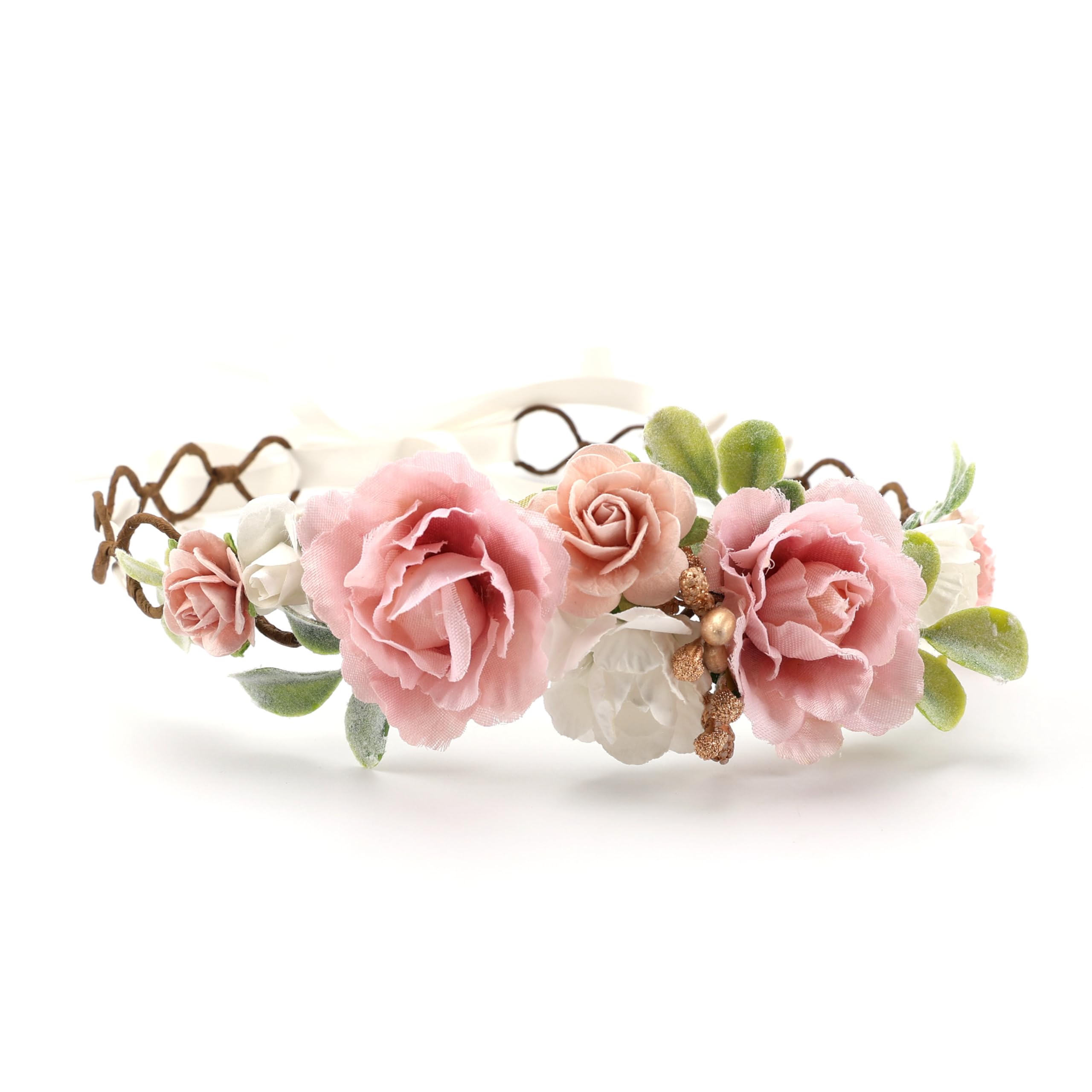 Handcrafted pastel blooms in blush pink, peach, and ivory for birthday photos.