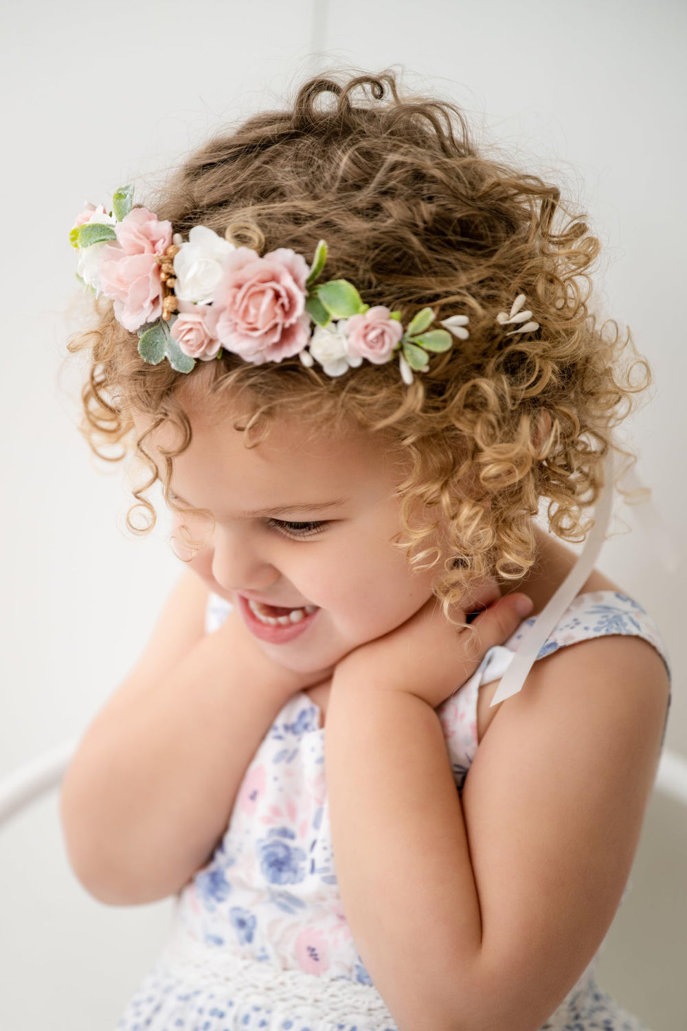 PoshMyra floral crown for weddings creates a soft halo for little attendants.