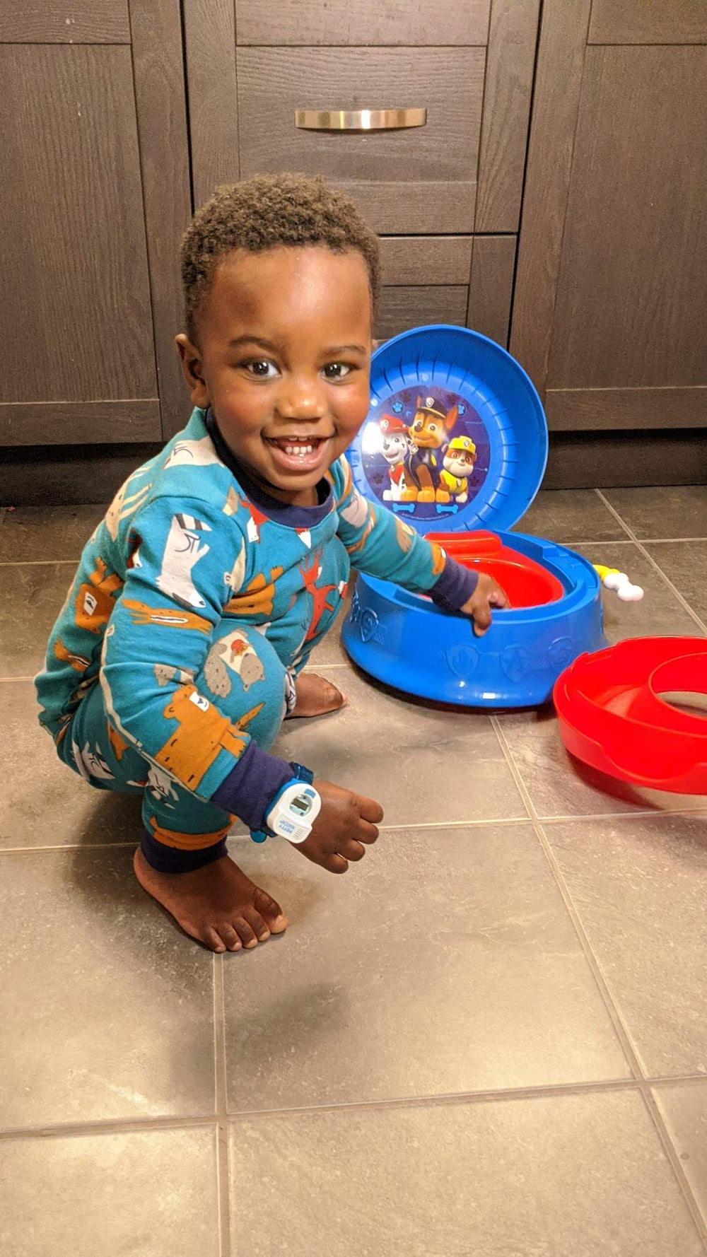 Blue Potty Watch on a kid’s wrist encouraging routine and fun use.