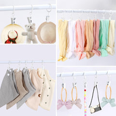 POVETIRE 30 metal ring hooks for baby bibs—organized hanging with durable clips.