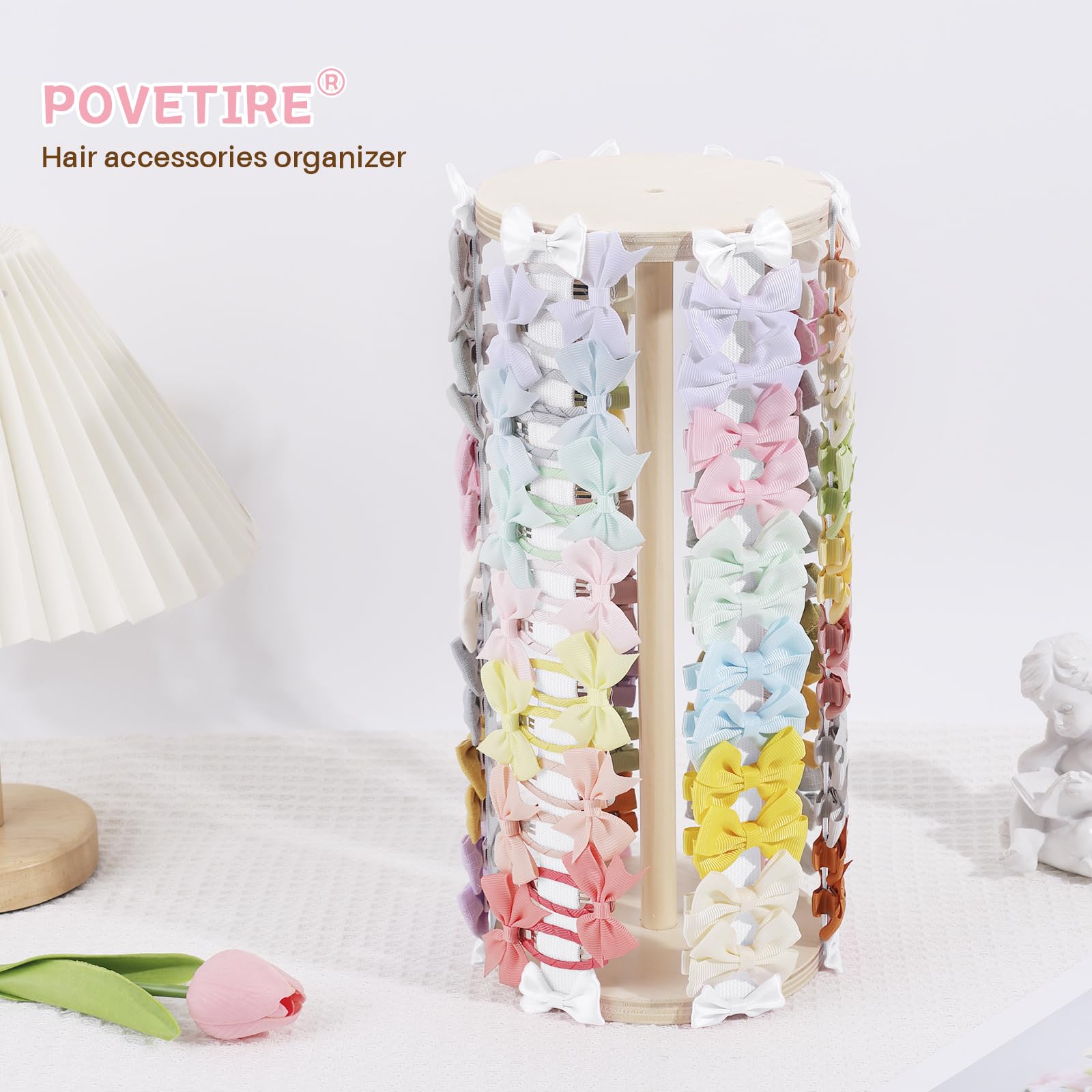 POVETIRE hair bow holder close-up shows polished surface and soft accents for gentle storage.