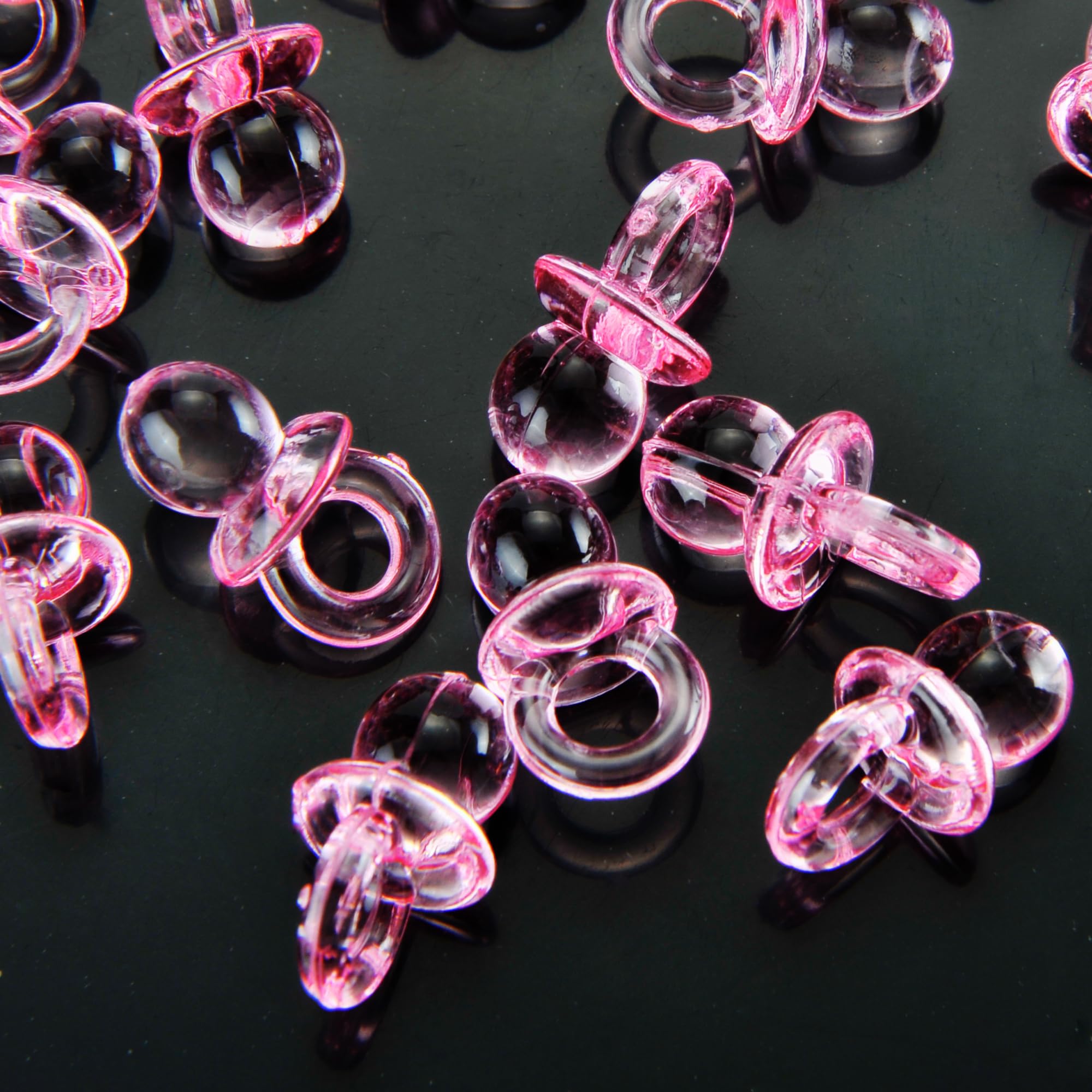 PowerTRC table scatter pacifiers add cohesive pink tone