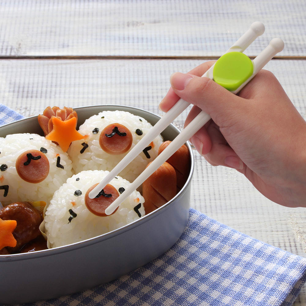 Poylim packaging shows a four-piece kid silverware set.
