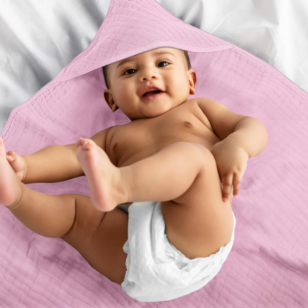 Folded Preboun baby towel set demonstrates compact storage and gift readiness.