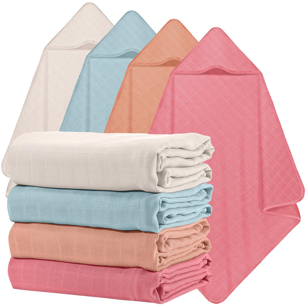 Preboun hooded baby towel in light pink demonstrates gentle drying after bath.