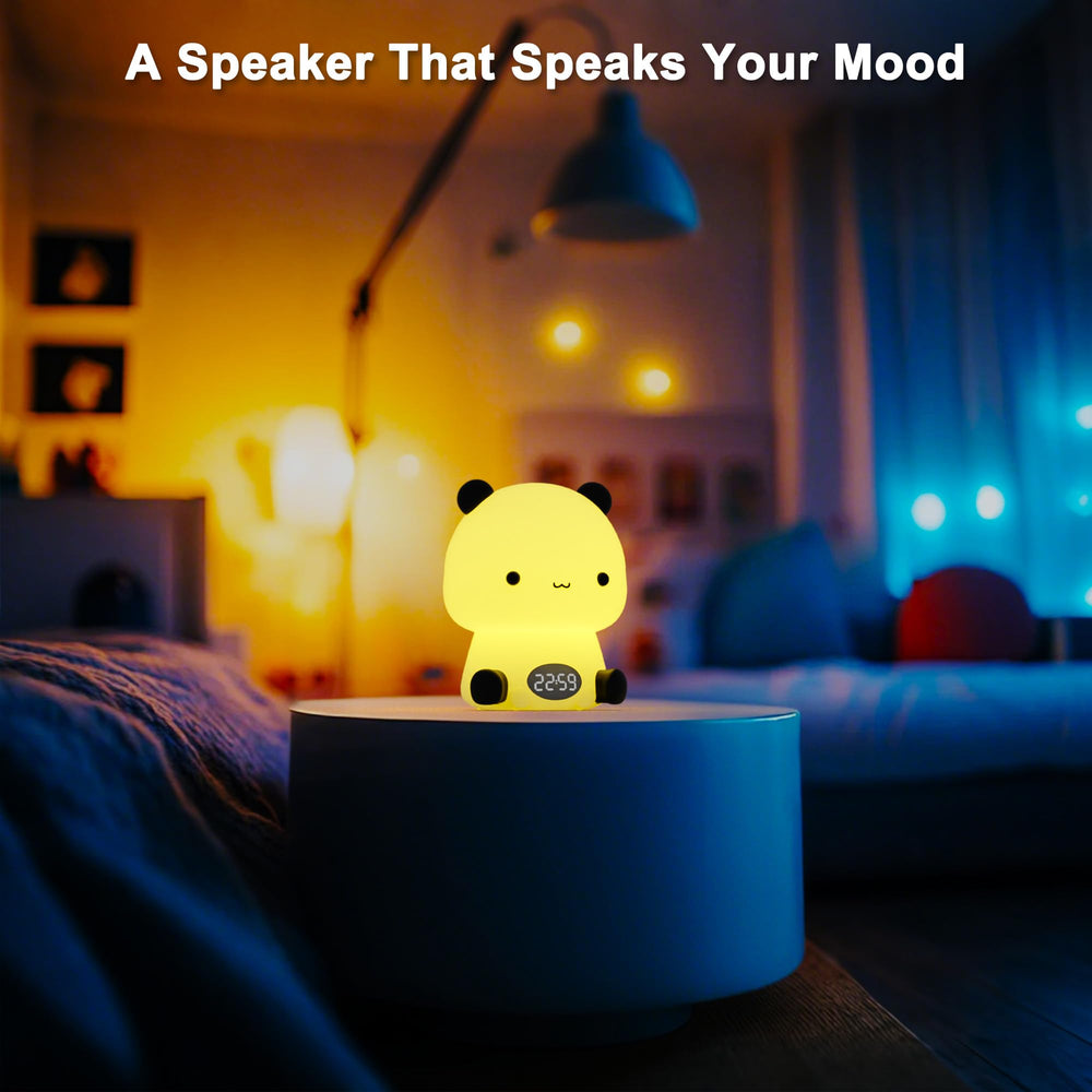 Premier Group panda clock with Bluetooth speaker plays music in the bedroom.