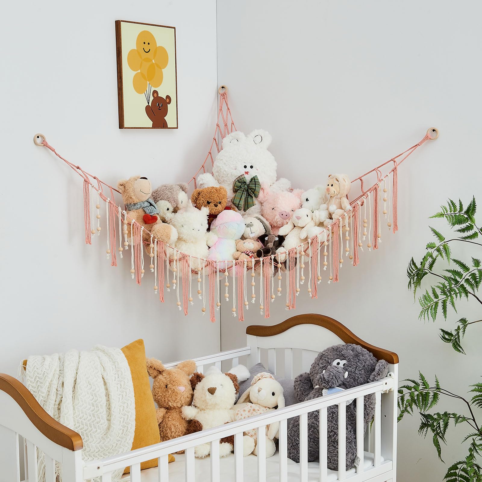Pretty Jolly gift-ready nursery decor featuring the hammock and tassels.