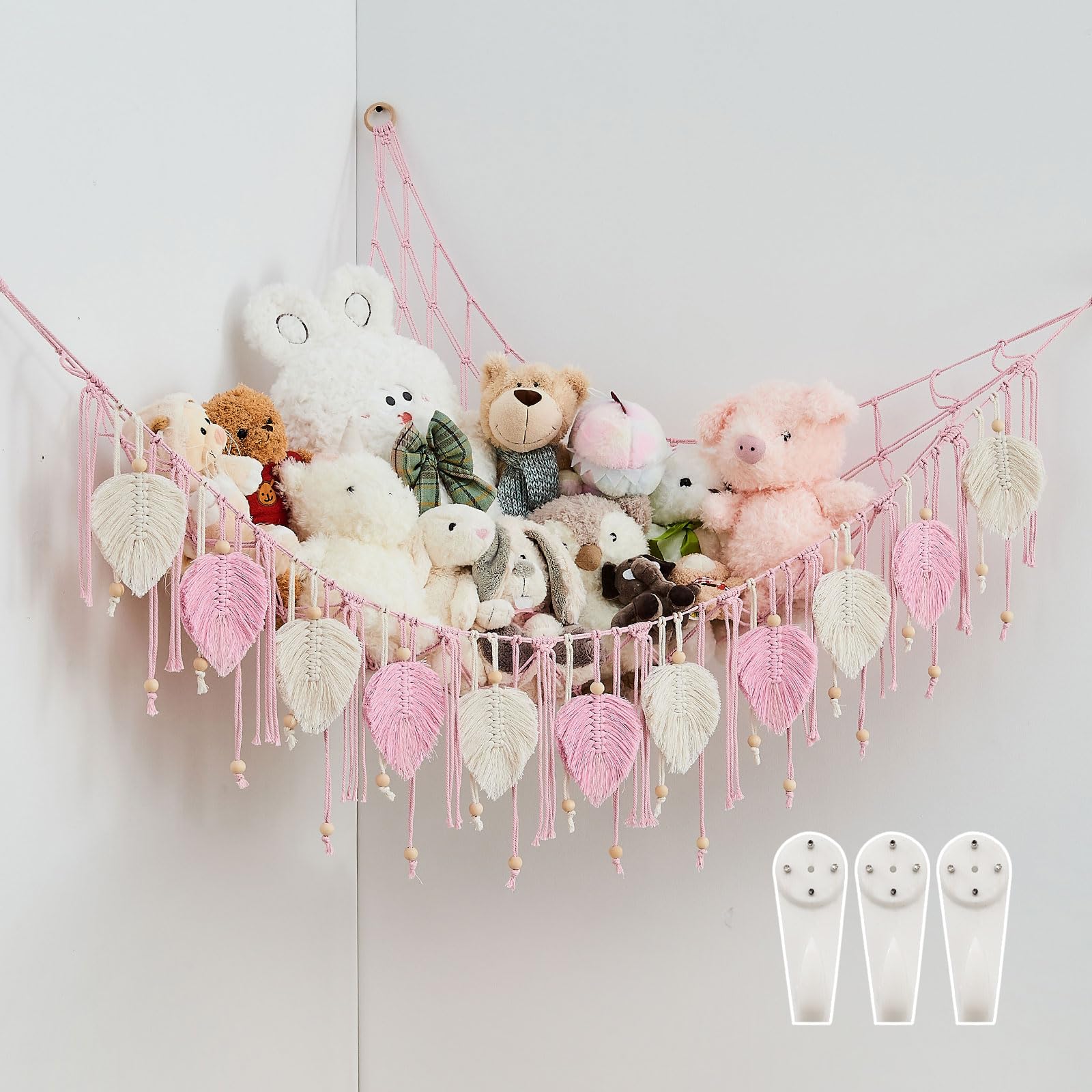 Pretty Jolly macrame hammock front view keeps plush toys neatly organized.