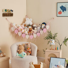 Pretty Jolly nursery scene showing cozy storage in a corner.