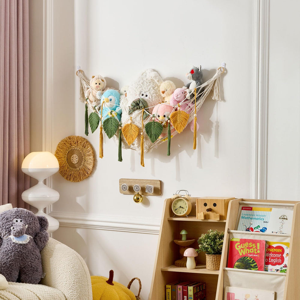 Pretty Jolly easy installation kit with hooks for quick setup in a nursery wall.