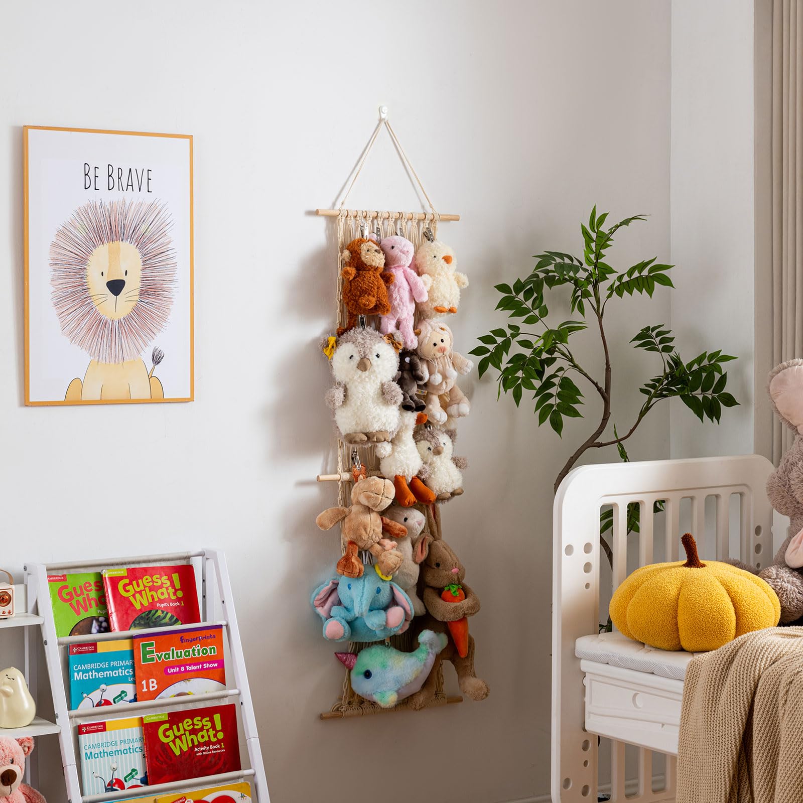Organized kid room with Pretty Jolly plush display on wall