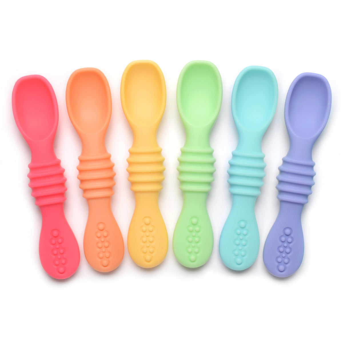PrimaStella Summer Rainbow chew spoon in use, helping baby practice self-feeding with a safe grip.