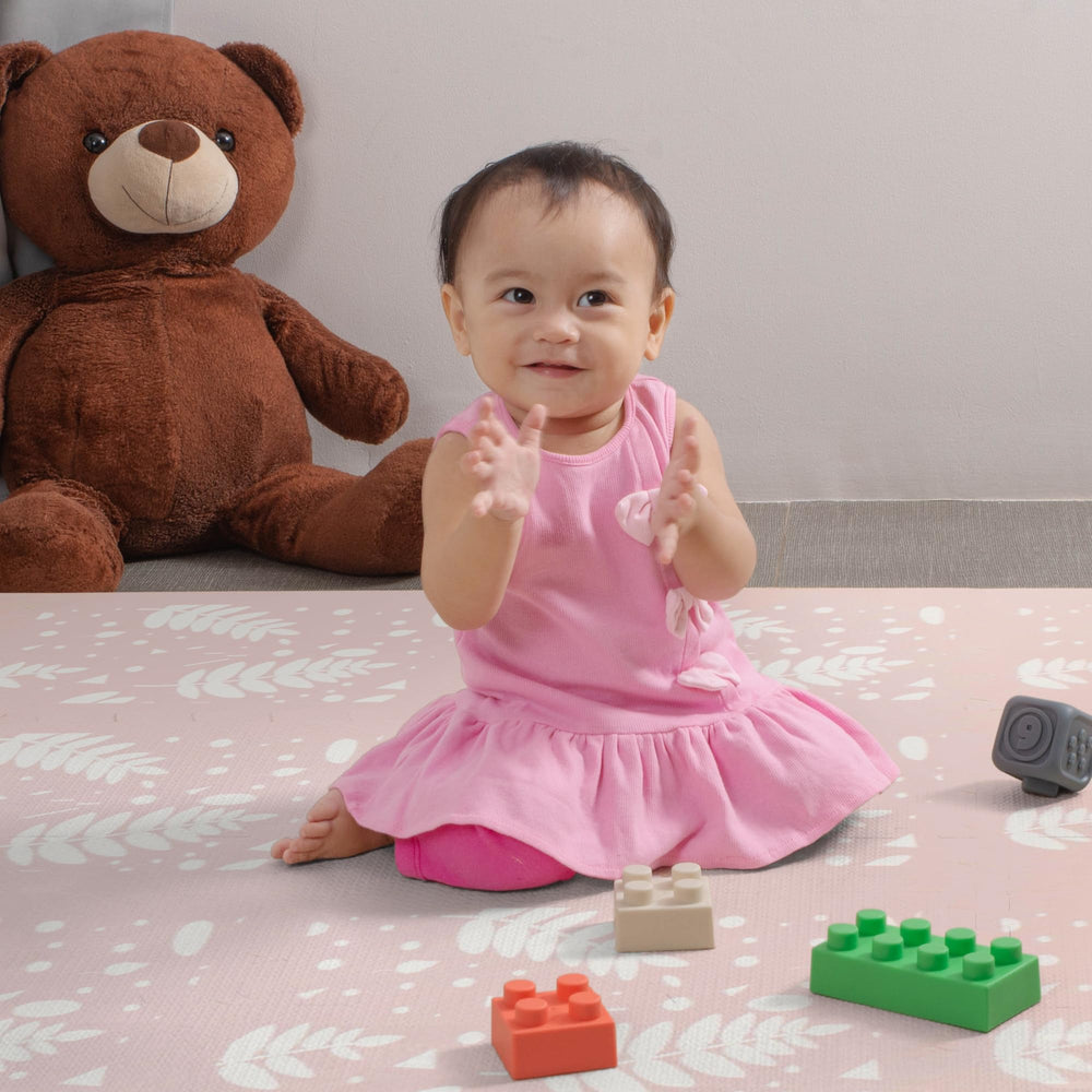 Primica large baby mat supports comfy floor time for little ones.