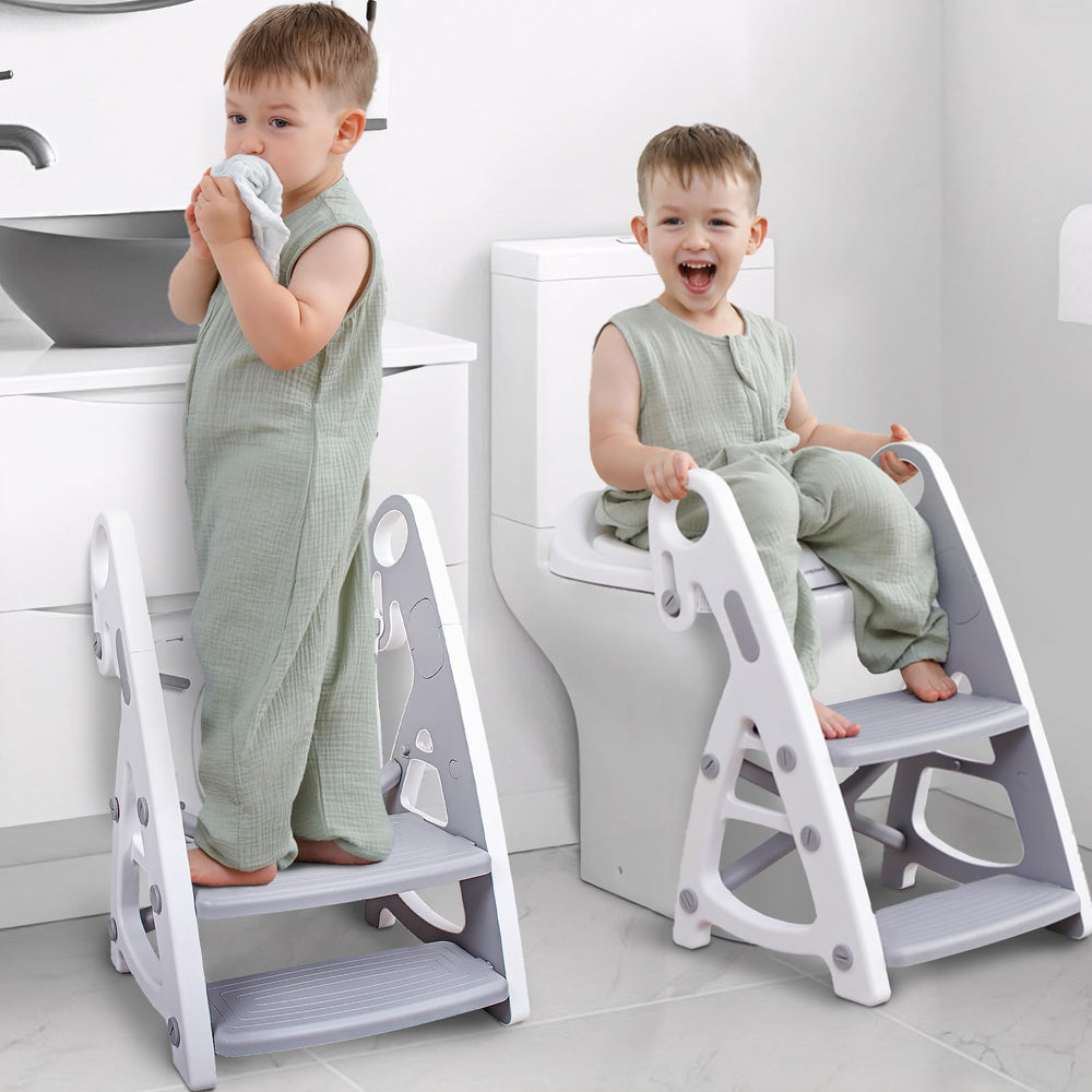 PRIMLECT potty training seat with stable base in grey, enhances toddler safety during bathroom use.