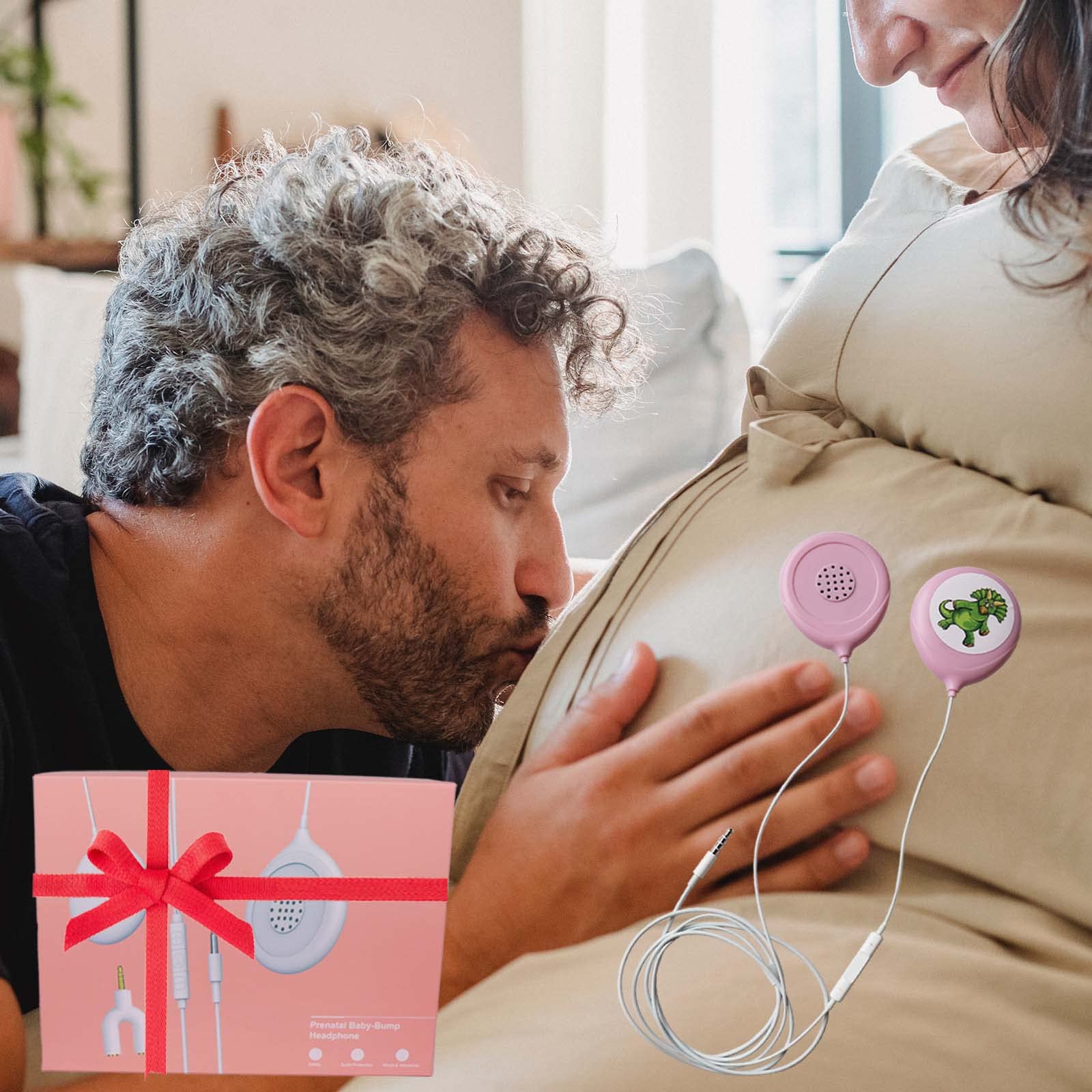 Prnaiev pink belly headphones with adapter cable for easy listening sessions.