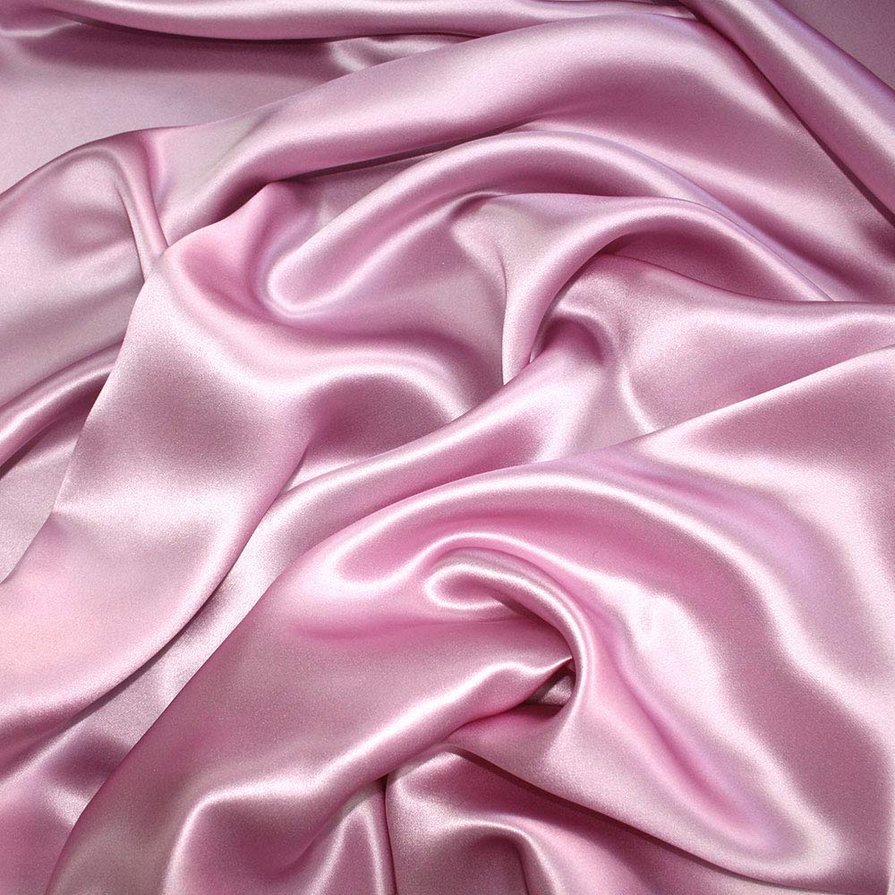 Pro Goleem pink satin nursing cover on pillow, showcases zipper protection for baby's skin safety.