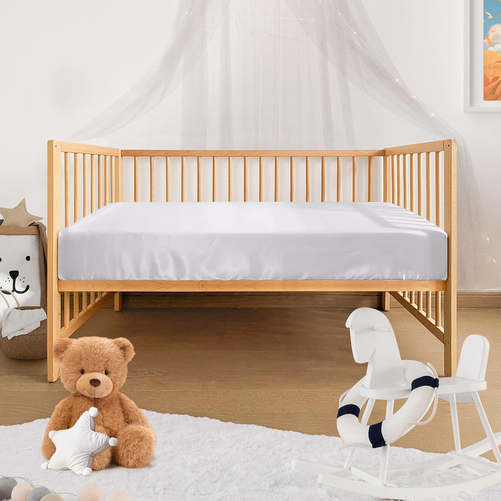 Pro Goleem satin soft crib sheet in white enhances nursery calm
