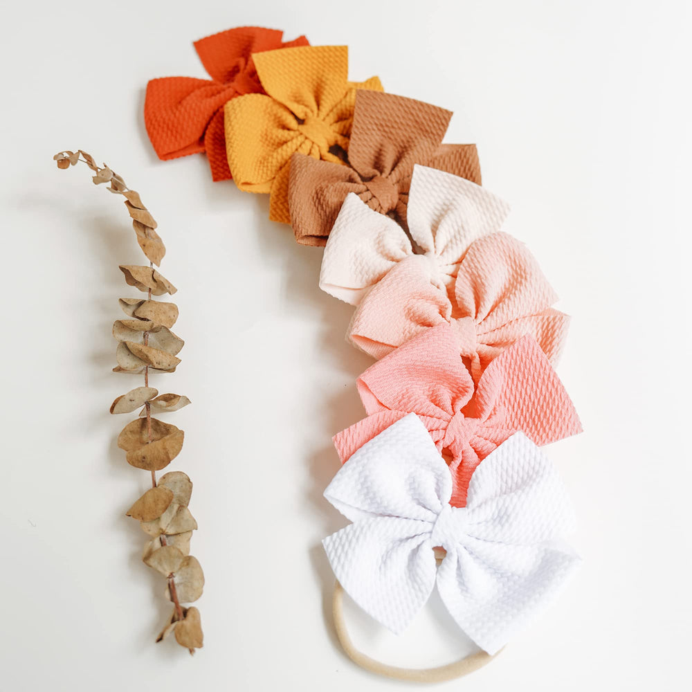 Prohouse bows ideal for birthdays, photos, holidays, and special occasions.