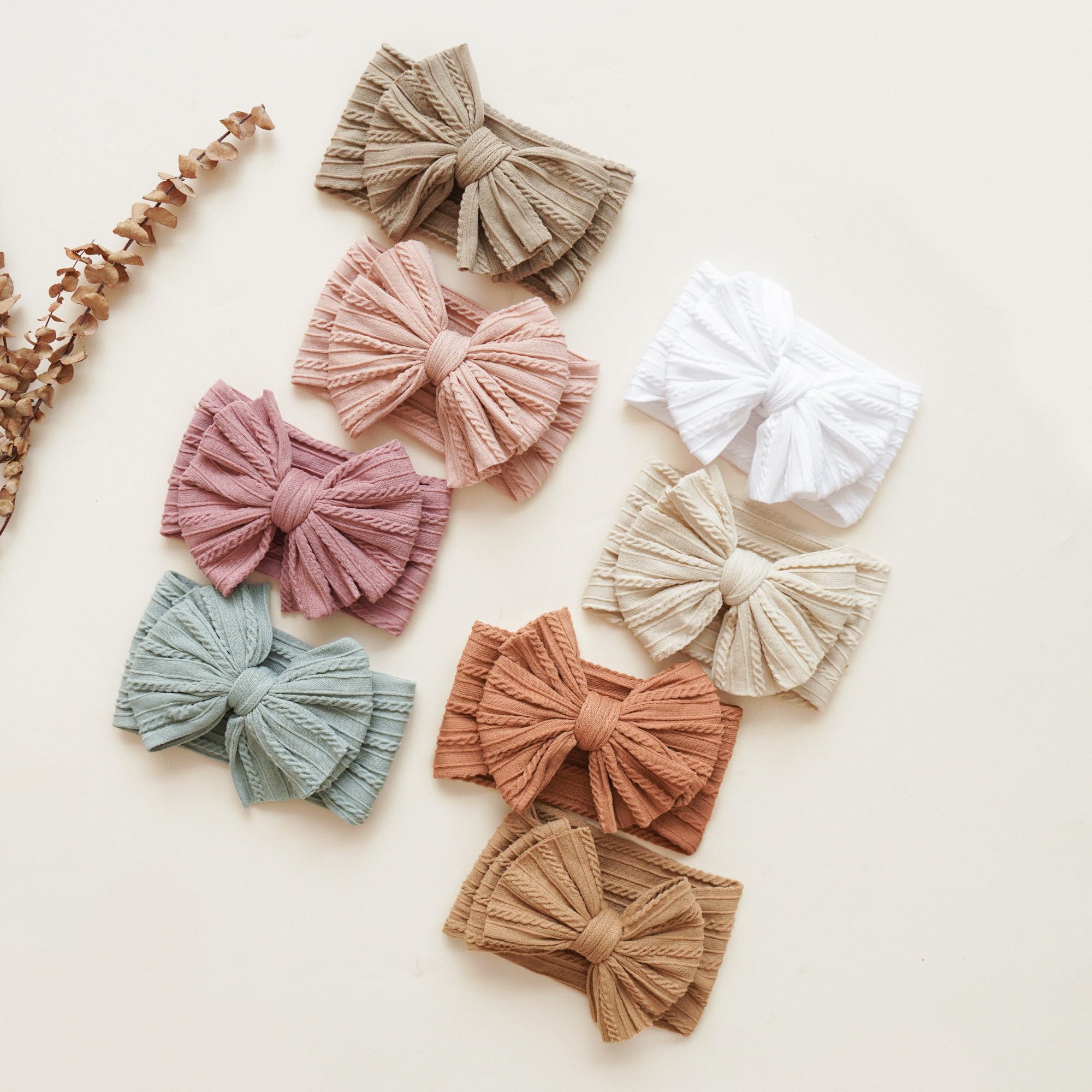 Prohouse one-size-fits-all headbands grow with your baby.