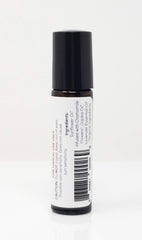 Punkin Butt Lavender Soothing Oil near baby's jawline to ease teething tension.