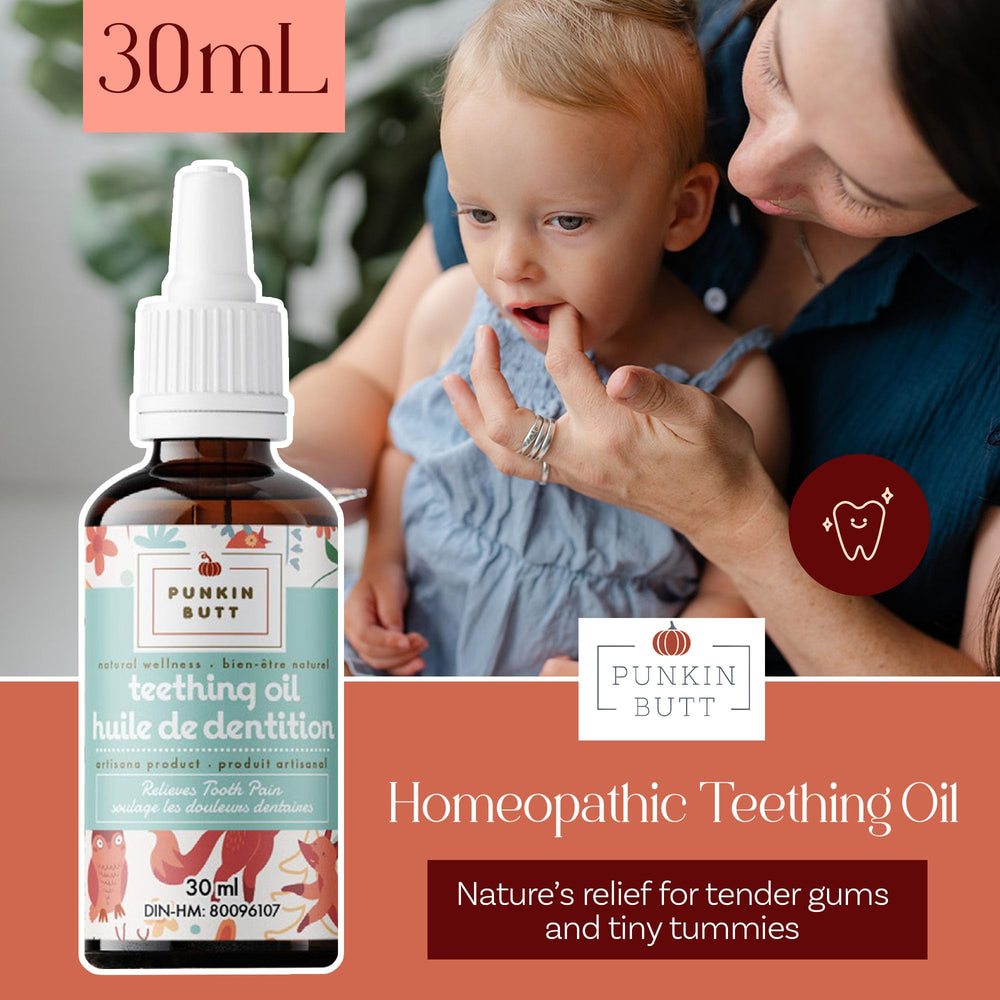 Punkin Butt teething oil drops applied to baby's gums for gentle care