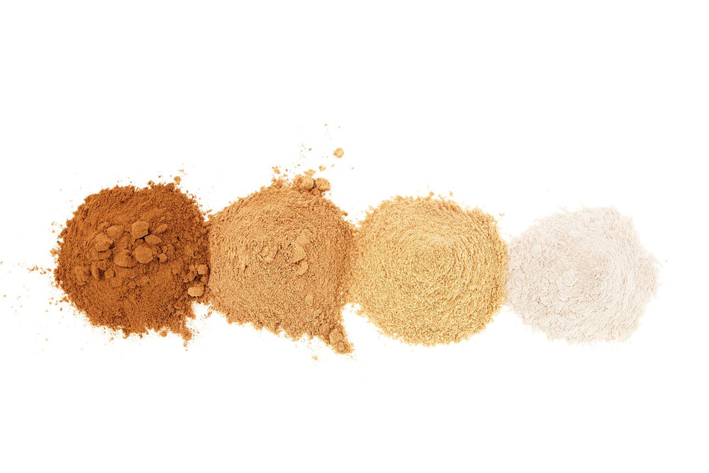 Pure Sol Sol Brush SPF 50 compact bottle ready for on-the-go touch-ups