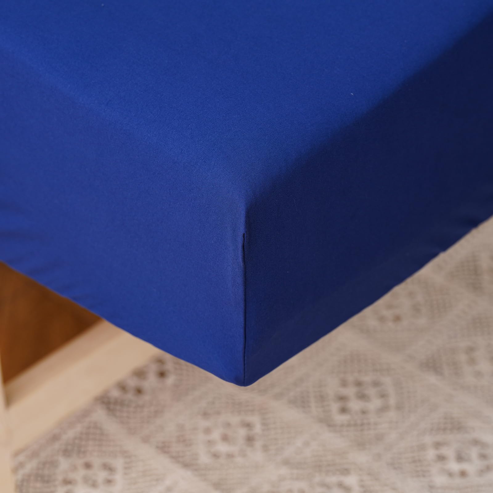 Pureant fitted sheet image demonstrates snug, secure fit for a toddler bed.