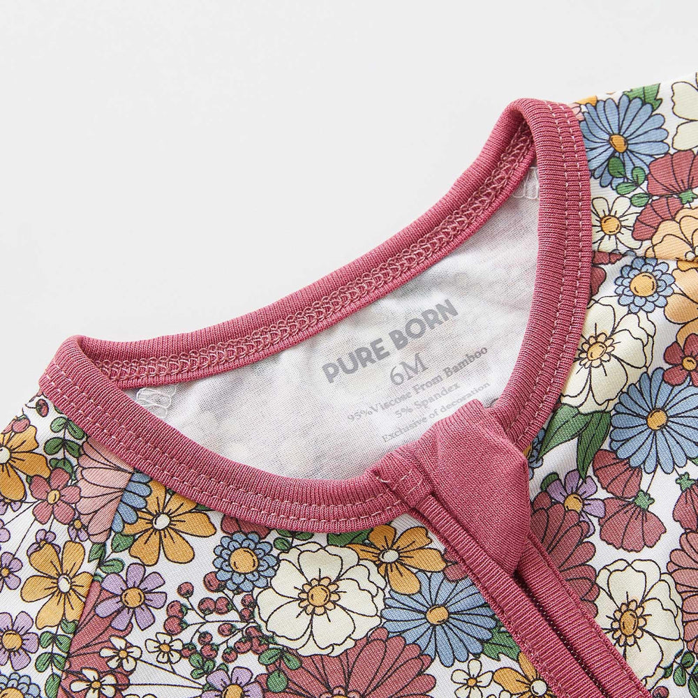 Pureborn reversible foot cuffs adapt from footed to footless.
