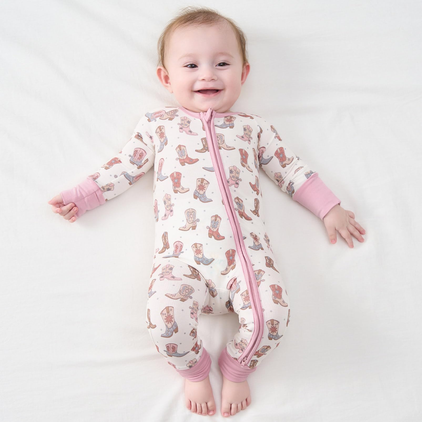 Pureborn sleeper 2-way zipper in action facilitates quick night diaper changes.